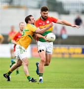 8 July 2017; Daniel St. Ledger of Carlow in action against Brendan Gallagher of Leitrim during the GAA Football All-Ireland Senior Championship Round 2B match between Carlow and Leitrim at Netwatch Cullen Park in Co Carlow. Photo by Barry Cregg/Sportsfile