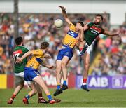 8 July 2017; Gary Brennan of Clare in action against Aidan O'Shea of Mayo during the GAA Football All-Ireland Senior Championship Round 3A match between Clare and Mayo at Cusack Park in Ennis, Co Clare. Photo by Diarmuid Greene/Sportsfile