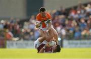 8 July 2017; John Egan of Westmeath in action against Brendan Donaghy during the GAA Football All-Ireland Senior Championship Round 2B match between Westmeath and Armagh at TEG Cusack Park in Mullingar, Co Westmeath. Photo by Piaras Ó Mídheach/Sportsfile