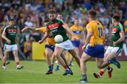 8 July 2017; Aidan O'Shea of Mayo in action against Eoghan Collins of Clare during the GAA Football All-Ireland Senior Championship Round 3A match between Clare and Mayo at Cusack Park in Ennis, Co Clare. Photo by Diarmuid Greene/Sportsfile