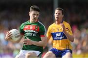 8 July 2017; Conor Loftus of Mayo in action against Kevin Harnett of Clare during the GAA Football All-Ireland Senior Championship Round 3A match between Clare and Mayo at Cusack Park in Ennis, Co Clare. Photo by Diarmuid Greene/Sportsfile