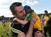 8 July 2017; Donegal manager Rory Gallagher celebrates with his son Seanie, age 3, at the end of the GAA Football All-Ireland Senior Championship Round 3A match between Meath and Donegal at Páirc Tailteann in Navan, Co Meath. Photo by David Maher/Sportsfile
