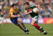 8 July 2017; Andy Moran of Mayo in action against Gordon Kelly of Clare during the GAA Football All-Ireland Senior Championship Round 3A match between Clare and Mayo at Cusack Park in Ennis, Co Clare. Photo by Diarmuid Greene/Sportsfile