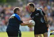 8 July 2017; Clare manager Colm Collins jokingly tussles for possession with linesman James Bermingham at half time in the GAA Football All-Ireland Senior Championship Round 3A match between Clare and Mayo at Cusack Park in Ennis, Co Clare. Photo by Diarmuid Greene/Sportsfile