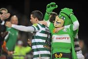 9 March 2012; Billy Dennehy, Shamrock Rovers, celebrates after scoring his side's second goal with Shamrock Rovers mascot Hooperman. Airtricity League Premier Division, Shamrock Rovers v Monaghan United, Tallaght Stadium, Tallaght, Dublin. Picture credit: David Maher / SPORTSFILE