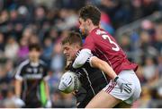 9 July 2017; Karl McKenna of Sligo is tackled by Sean Mulkerrin of Galway during the Electric Ireland Connacht GAA Football Minor Championship Final between Galway and Sligo at Pearse Stadium in Galway. Photo by Ramsey Cardy/Sportsfile