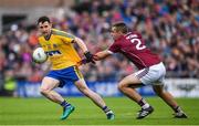9 July 2017; Ciaran Murtagh of Roscommon is tackled by Cathal Sweeney of Galway during the Connacht GAA Football Senior Championship Final match between Galway and Roscommon at Pearse Stadium in Galway. Photo by Ramsey Cardy/Sportsfile
