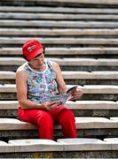 9 July 2017; A Cork supporter reads her match programme before the Munster GAA Hurling Senior Championship Final match between Clare and Cork at Semple Stadium in Thurles, Co Tipperary. Photo by Brendan Moran/Sportsfile