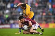 9 July 2017; Eoghan Kerin of Galway is tackled by Fintan Cregg of Roscommon during the Connacht GAA Football Senior Championship Final match between Galway and Roscommon at Pearse Stadium in Galway. Photo by Ramsey Cardy/Sportsfile