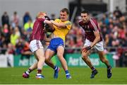 9 July 2017; Enda Smith of Roscommon is tackled by Declan Kyne, left, and Fiontán Ó Curraoin of Galway during the Connacht GAA Football Senior Championship Final match between Galway and Roscommon at Pearse Stadium in Galway. Photo by Ramsey Cardy/Sportsfile
