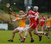 9 July 2017; Michael McGreevy of Antrim in action against Martin Quinn and Eoghan Kane of Derry during the Electric Ireland Ulster GAA Hurling Minor Championship Final match between Antrim and Derry at Owenbeg in Co Derry. Photo by Oliver McVeigh/Sportsfile