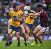 9 July 2017; Sean McDermott of Roscommon is tackled by Gary O'Donnell, left, and Paul Conroy of Galway during the Connacht GAA Football Senior Championship Final match between Galway and Roscommon at Pearse Stadium in Galway. Photo by Ramsey Cardy/Sportsfile