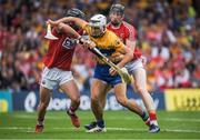 9 July 2017; Aron Shanagher of Clare is tackled by Colm Spillane and Damian Cahalane of Cork during the Munster GAA Hurling Senior Championship Final match between Clare and Cork at Semple Stadium in Thurles, Co Tipperary. Photo by Brendan Moran/Sportsfile