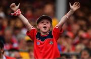9 July 2017; A young Cork supporter cheers on her side during the Munster GAA Hurling Senior Championship Final match between Clare and Cork at Semple Stadium in Thurles, Co Tipperary. Photo by Brendan Moran/Sportsfile