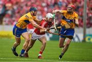 9 July 2017; Luke Meade of Cork is tackled by David McInerney, left, and David Fitzgerald of Clare during the Munster GAA Hurling Senior Championship Final match between Clare and Cork at Semple Stadium in Thurles, Co Tipperary. Photo by Brendan Moran/Sportsfile