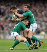 10 March 2012; Max Evans, Scotland, is tackled by Gordon D'Arcy and Eoin Reddan, right, Ireland. RBS Six Nations Rugby Championship, Ireland v Scotland, Aviva Stadium, Lansdowne Road, Dublin. Picture credit: Matt Browne / SPORTSFILE