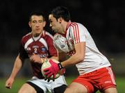 10 March 2012; Kyle Coney, Tyrone, in action against Michael Curley, Westmeath. Allianz Football League, Division 2, Round 4, Tyrone v Westmeath, Healy Park, Omagh, Co. Tyrone. Picture credit: Oliver McVeigh / SPORTSFILE