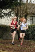 10 March 2012; Eventual winner Clodagh O'Reilly, Loreto College, Cavan, races alongside Niamh Casey, Mercy, Waterford, right, during the Junior Girls race at the Aviva All-Ireland Schools' Cross Country 2012. St Mary’s College, Galway. Picture credit: Pat Murphy / SPORTSFILE