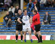 11 March 2012; Referee Michael Meade shows Cavan's Brendan Fitzpatrick the red card. Allianz Football League Division 4, Round 4, Tipperary v Cavan, Semple Stadium, Thurles, Co. Tipperary. Picture credit: Brian Lawless / SPORTSFILE