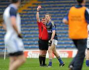 11 March 2012; Referee Michael Meade shows Tipperary's Brian Jones the red card. Allianz Football League Division 4, Round 4, Tipperary v Cavan, Semple Stadium, Thurles, Co. Tipperary. Picture credit: Brian Lawless / SPORTSFILE