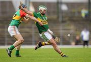 11 March 2012; Michael Boyle, Kerry, kicks the ball away under pressure from Alan Corcoran, Carlow. Allianz Hurling League Division 2A, Round 2, Kerry v Carlow, Fitzgerald Stadium, Killarney, Co. Kerry. Picture credit: Diarmuid Greene / SPORTSFILE