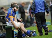 11 March 2012; Eoin Kelly, Tipperary, sits on the bench after picking up an injury during the game. Allianz Hurling League Division 1A, Round 2, Tipperary v Galway, Semple Stadium, Thurles, Co. Tipperary. Picture credit: Brian Lawless / SPORTSFILE