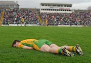11 March 2012; Leo McLoone, Donegal, lays on the pitch after picking up a knock from a challenge with Paul Galvin, Kerry. Allianz Football League Division 1, Round 4, Kerry v Donegal, Fitzgerald Stadium, Killarney, Co. Kerry. Picture credit: Diarmuid Greene / SPORTSFILE