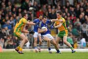 11 March 2012; Brian McGuire, Kerry, in action against David Walsh, left, and Martin O'Reilly, Donegal. Allianz Football League Division 1, Round 4, Kerry v Donegal, Fitzgerald Stadium, Killarney, Co. Kerry. Picture credit: Diarmuid Greene / SPORTSFILE