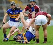 11 March 2012; Donagh Maher, Tipperary, in action against Bernard Burke, Galway. Allianz Hurling League Division 1A, Tipperary v Galway, Semple Stadium, Thurles, Co. Tipperary. Picture credit: Brian Lawless / SPORTSFILE