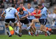 11 March 2012; Michael Darragh McAuley, Dublin, supported by Caig Dias, 7, and Darren Daly, in action  against Caolan Rafferty and Aidan Fosker, Armagh. Allianz Football League Division 1, Round 4, Dublin v Armagh, Croke Park, Dublin. Picture credit: Ray McManus / SPORTSFILE