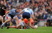 11 March 2012; Kevin Dyas, Armagh, in action against Darren Daly, 2, and Paul Flynn, Dublin. Allianz Football League Division 1, Round 4, Dublin v Armagh, Croke Park, Dublin. Picture credit: Ray McManus / SPORTSFILE