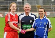 11 March 2012; Tyrone captain Shannon Quinn, left, and Monaghan captain Sharon Courtney, right, shake hands across referee Terence McShea before the game. Bord Gais Energy Ladies National Football League Division 1, Round 5, Tyrone v Monaghan, Healy Park, Omagh, Co. Tyrone. Picture credit: Oliver McVeigh / SPORTSFILE