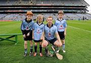11 March 2012; Dublin mascots Sean Geoghan, left, and Tiernan Ryan, right, both from Skerries, and Jack Murphy, from Swords, who was a 'special guest' of the Dublin County Board, with Dublin captain John McCaffrey before the game. Allianz Hurling League Division 1A, Round 2,  Croke Park, Dublin. Picture credit: Ray McManus / SPORTSFILE