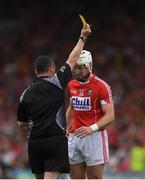 9 July 2017; Patrick Horgan of Cork is shown a yellow card by Referee Fergal Horgan during the Munster GAA Hurling Senior Championship Final match between Clare and Cork at Semple Stadium in Thurles, Co Tipperary. Photo by Ray McManus/Sportsfile