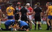 9 July 2017; Patrick Horgan, 14,  of Cork speaks to referee Fergal Horgan before being shown a yellow card during the Munster GAA Hurling Senior Championship Final match between Clare and Cork at Semple Stadium in Thurles, Co Tipperary. Photo by Ray McManus/Sportsfile