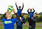 11 July 2017; Isa Nacewa and Richardt Strauss with young players Conor McFadden, age 10, from Balbriggan, Co. Dublin, and Tara Hickey, age 9, from Balbriggan, Co. Dublin, in action during the Bank of Ireland Leinster Rugby Summer Camp at Balbriggan RFC in Dublin. Photo by Eóin Noonan/Sportsfile