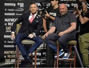 July 11 2017; Conor McGregor of Ireland, left, and UFC President Dana White on stage during the world tour press conference to promote the upcoming Mayweather vs McGregor boxing fight at Staples Center in Los Angeles, USA.  Photo by Gary A. Vasquez/Sportsfile