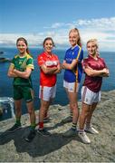 13 July 2017; Stars of the TG4 All Ireland Championships assembled at the famous Dún Aengus on Inis Mór in the Aran Islands to launch the 2017 TG4 All Ireland Championships. The championship gets underway when the preliminary rounds take place on July 22nd as 36 counties begin the journey that will take them to Croke Park on September 24th. TG4 also announced their search for the #properfan that will take place throughout the 2017 TG4 All Ireland Champinships. Pictured are ladies footballers, from left, Niamh O'Sullivan of Meath, Ciara o'Sullivan of Cork, Aishling Moloney of Tipperary, and Sinead Burke of Galway, at Dún Aengus, Inis Mór, Aran Islands, Co. Galway.  Photo by Seb Daly/Sportsfile
