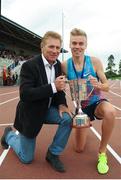 12 July 2017; Eamonn Coghlan presents the trophy to Stewart McSweyn from Australia after he won the Men's 5000m, and new stadium record of 13.19.99, during the Morton Games at Morton Stadium in Santry, Co Dublin. Photo by Tomás Greally/Sportsfile