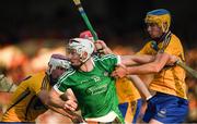 12 July 2017; Cian Lynch of Limerick in action against Michael Moloney, left, and Dara Walsh of Clare during the Bord Gais Energy Munster GAA Hurling Under 21 Championship Semi-Final match between Limerick and Clare at the Gaelic Grounds in Limerick. Photo by Brendan Moran/Sportsfile