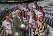 13 July 2017; TG4 2017 All Ireland Championships were launched at Croke Park today, with representatives of the Senior, Intermediate and Junior competitions present at the launch. It was announced that a new ‘score assistant’ will be used for 2017 and TG4’s footage will be available to help referees adjudicate scores, with Hawkeye also being announced for use at the TG4 All Ireland Finals in Croke Park. Pictured are TG4 deputy chief executive Pádhraic Ó Ciardha, and LGFA President Marie Hickey, with All Ireland Senior competition teams representative players at Croke Park, Dublin. Photo by Seb Daly/Sportsfile