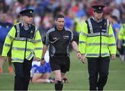 13 July 2017; Match referee Fergal Horgan is escorted off the pitch by Gardai after the Bord Gais Energy Munster GAA Hurling Under 21 Championship Semi-Final match between Waterford and Cork at Walsh Park in Waterford. Photo by Ray McManus/Sportsfile