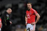 10 March 2012; Referee Cormac Reilly notes the name of Alan O'Connor, Cork, before issuing him a 'yellow card'. Allianz Football League, Division 1, Round 4, Laois v Cork, O'Moore Park, Portlaoise, Co. Laois. Picture credit: Ray McManus / SPORTSFILE