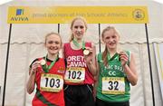 10 March 2012; Winner of the Junior Girls 2000m race Clodagh O'Reilly, Loreto College, Cavan, centre, alongside second placed Zoe Carruthers, Friends School Lisburn, Co. Antrim, left, and third placed Carla Sweeney, St. MacDara's CC, Co. Dublin, right. Aviva All-Ireland Schools' Cross Country 2012, St Mary’s College, Galway. Picture credit: Diarmuid Greene / SPORTSFILE