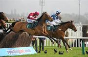 14 March 2012; Teaforthree, with John Thomas McNamara up, right, leads eventual third place Four Commanders, with Nina Carberry up, over the last, first time round, on their way to winning the Diamond Jubilee National Hunt Steeple Chase. Cheltenham Racing Festival, Prestbury Park, Cheltenham, England. Picture credit: Brendan Moran / SPORTSFILE