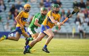12 July 2017; Michael O'Malley of Clare in action against Andrew La Touche Cosgrave of Limerick during the Bord Gais Energy Munster GAA Hurling Under 21 Championship Semi-Final match between Limerick and Clare at the Gaelic Grounds in Limerick. Photo by Brendan Moran/Sportsfile