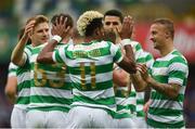 14 July 2017; Scott Sinclair of Celtic celebrates with team-mate after scoring his side's first goal during the UEFA Champions League Second Qualifying Round First Leg match between Linfield and Glasgow Celtic at the National Football Stadium in Windsor Park, Belfast. Photo by David Fitzgerald/Sportsfile