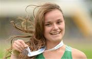 15 July 2017; Jo Keane of St Flannan's Ennis, Co Clare, representing Ireland with her medal after claiming third in the Girls 800m event during the SIAB T&F Championships at Morton Stadium in Santry, Co. Dublin. Photo by Piaras Ó Mídheach/Sportsfile