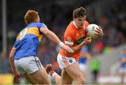 15 July 2017; Niall Grimley of Armagh in action against George Hannigan of Tipperary during the GAA Football All-Ireland Senior Championship Round 3B match between Tipperary and Armagh at Semple Stadium in Thurles, Co Tipperary. Photo by Ray McManus/Sportsfile