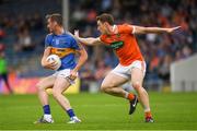 15 July 2017; Conor Sweeney of Tipperary in action against Charlie Vernon of Armagh during the GAA Football All-Ireland Senior Championship Round 3B match between Tipperary and Armagh at Semple Stadium in Thurles, Co Tipperary. Photo by Ray McManus/Sportsfile